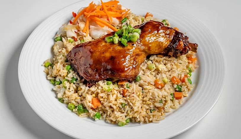 Best chicken confit on fried rice in Calgary, AB