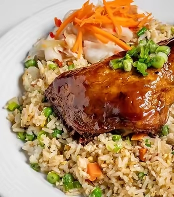Best chicken confit on fried rice in Calgary, AB